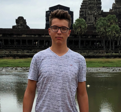 teenage boy wearing glasses