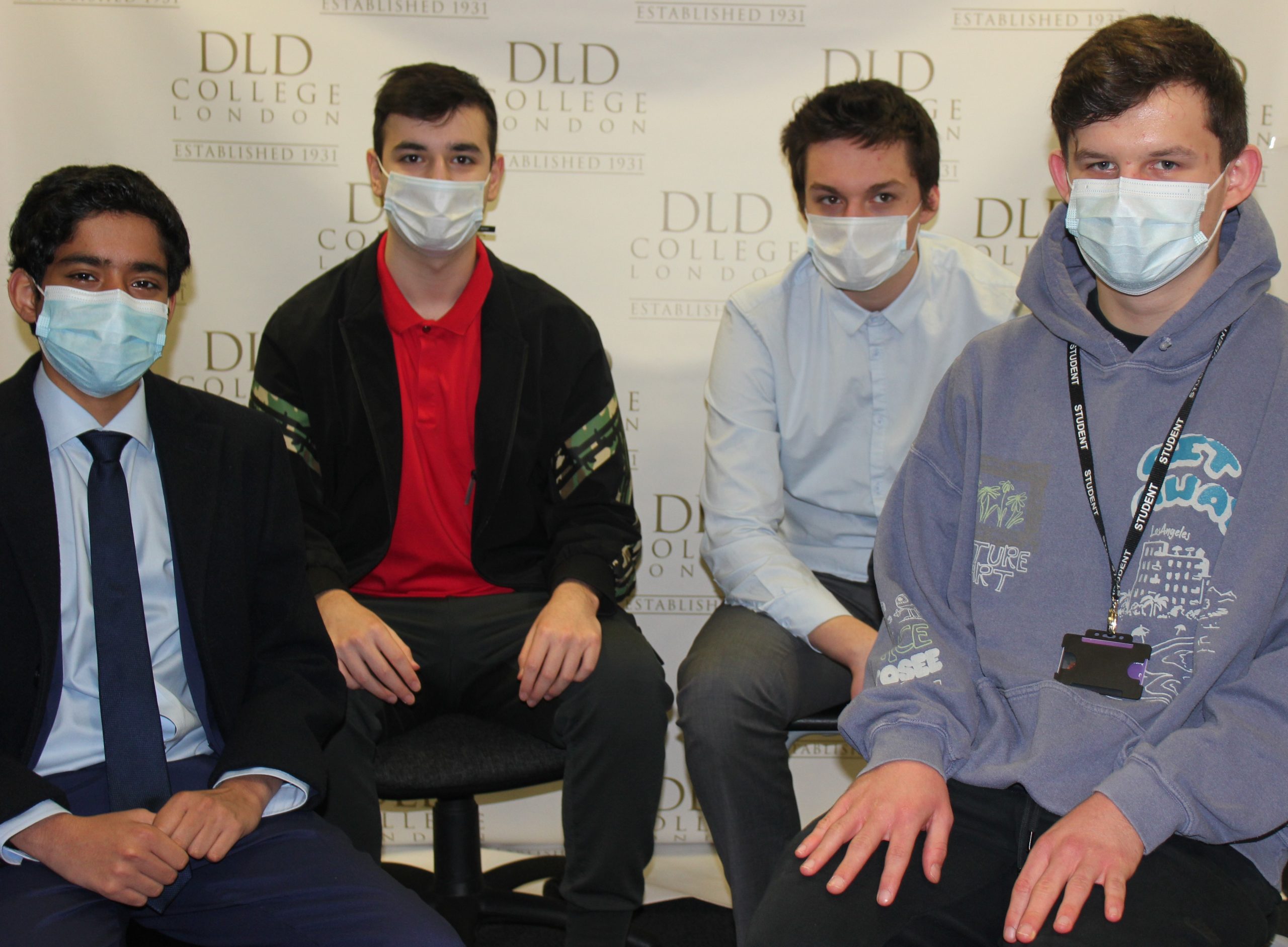 BTEC Students sat down wearing face masks