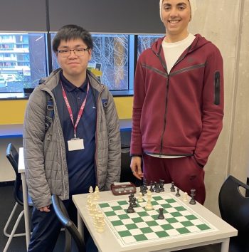 students with their chess set