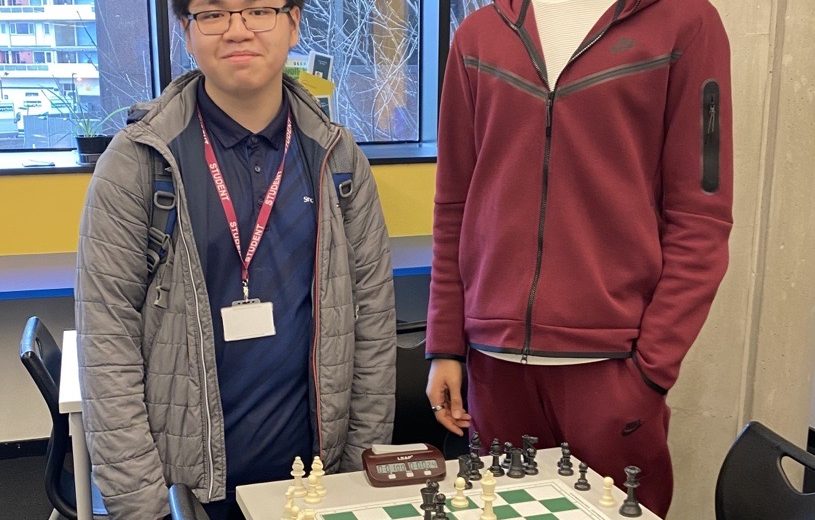 students with their chess set