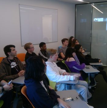 students sat in the classroom listening